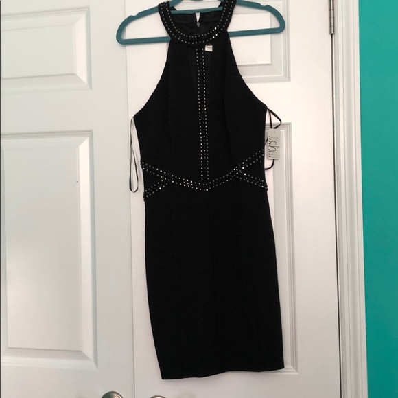 Nikibiki Dresses & Skirts - Sexy/Sophisticated one of a kind Dress